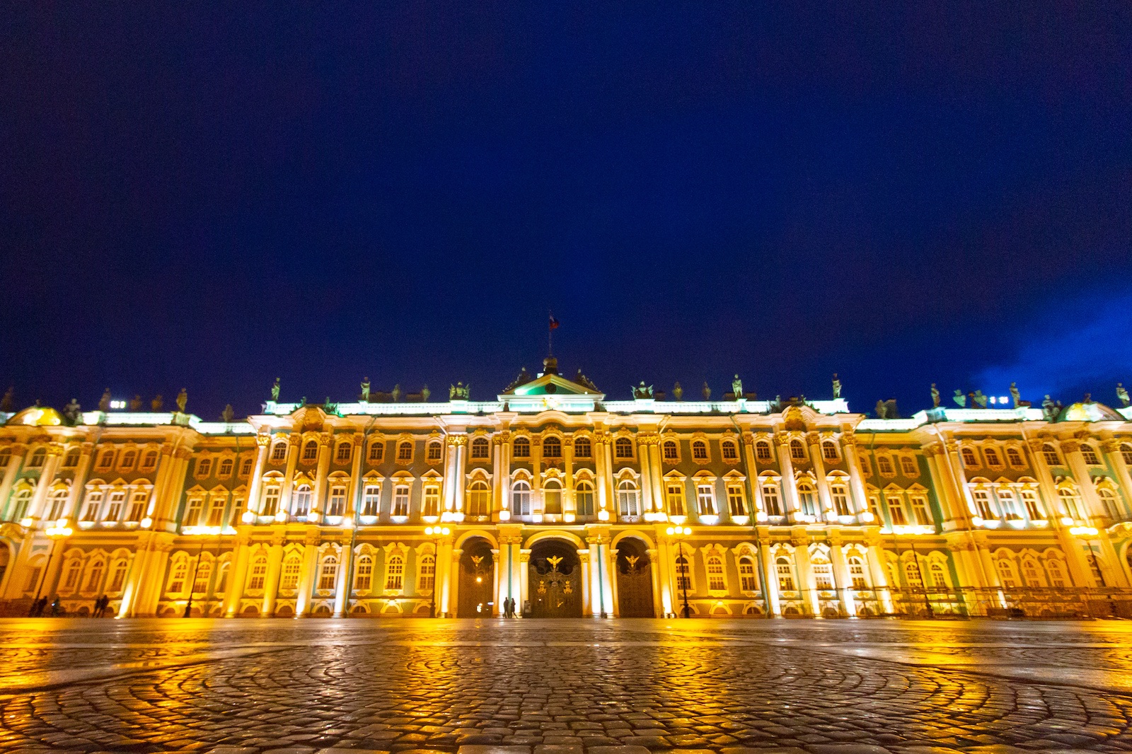 A night shot of the facade of St. Petersburg's Winter Palace. Somewhat Russian, somewhat European in architecture.